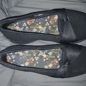 Skechers Women's Black Slip-On Flats with Floral Insole